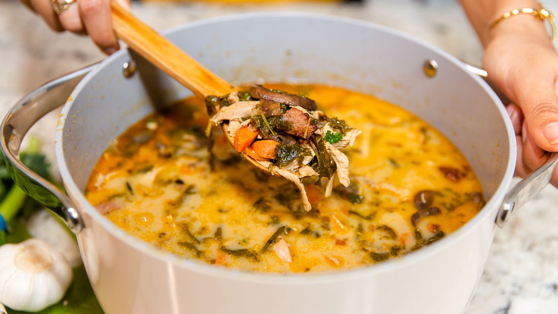 Cream Chicken, Sausage and Kale Soup in a Caraway pan